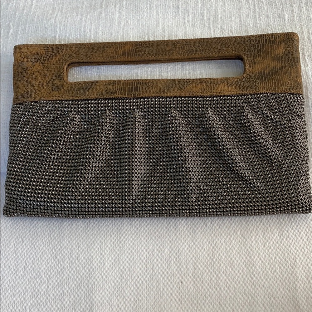 Leather and metallic clutch